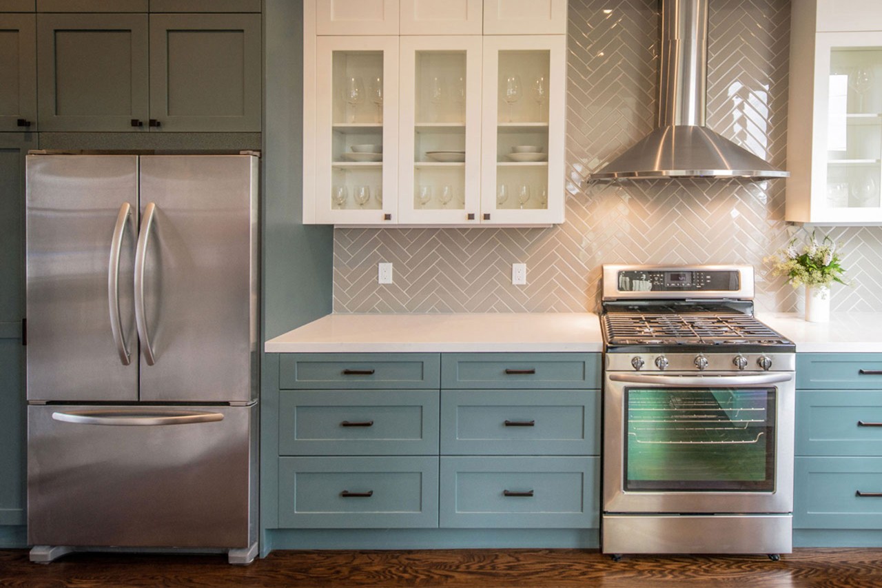 Modern Kitchen with Teal Base Cabinets